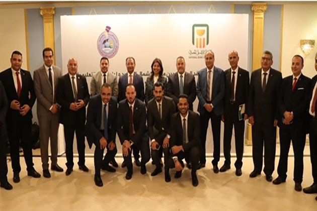 تعاون بين البنك الأهلي ووزارة المالية لميكنة صرف مستحقات العاملين بالإدارة التعليمية بالمنيا لمدة 5 سنوات