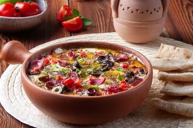 طريقة عمل طاجن الفول بالطحينة